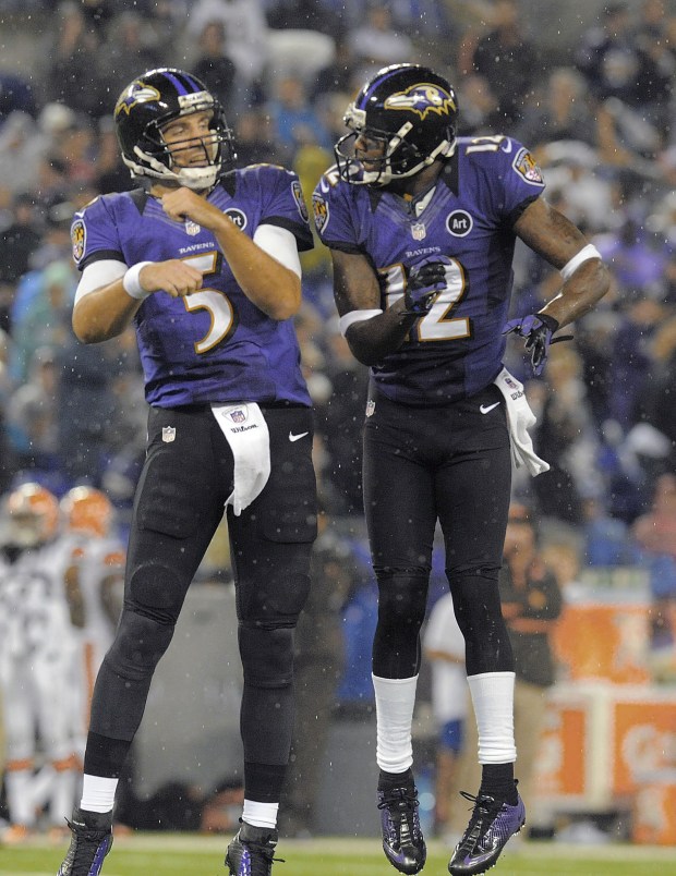 Ravens quarterback Joe Flacco, left, and wide receiver Jacoby Jones ...