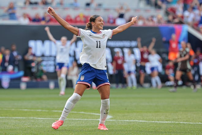 Sophia Smith celebrates her goal against Mexico.